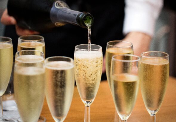 Champagne being poured at the American Bar
