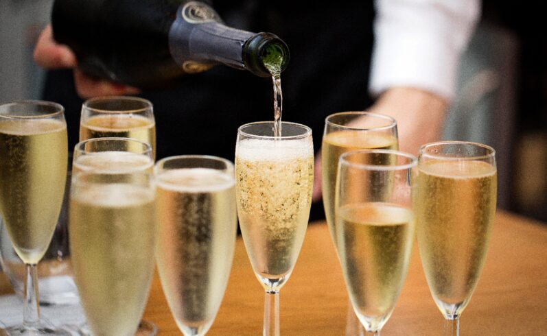 Champagne being poured at the American Bar