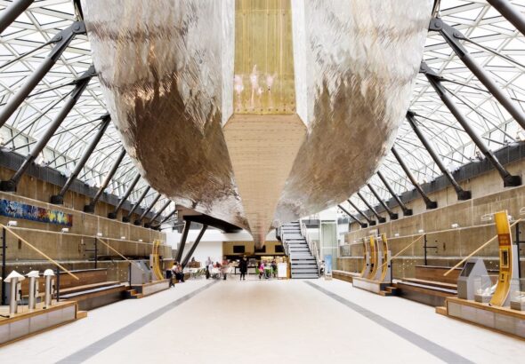 People sitting at tables in the main hall