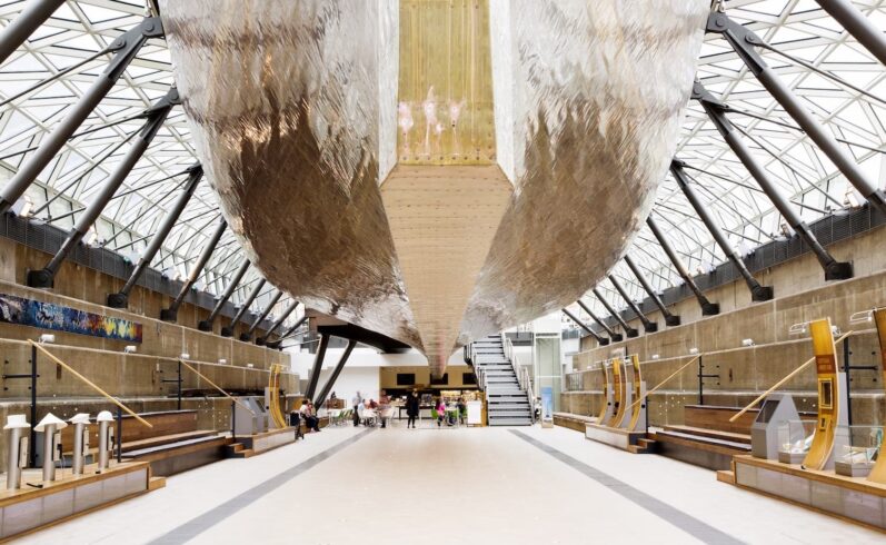 People sitting at tables in the main hall
