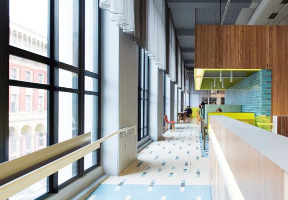 People sitting at tables in the cafe