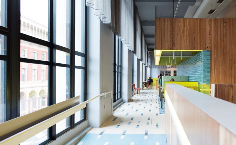 People sitting at tables in the cafe