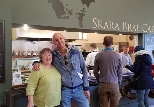 Customers hugging inside the Cafe