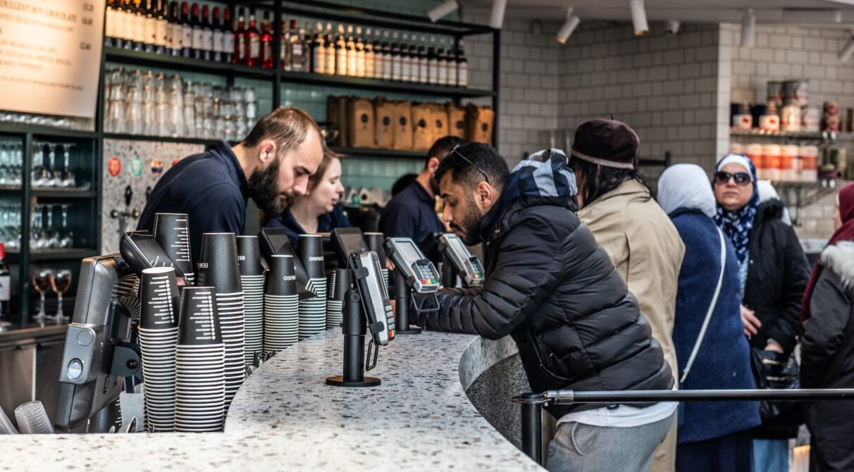 Benugo staff serving customer from behind the counter