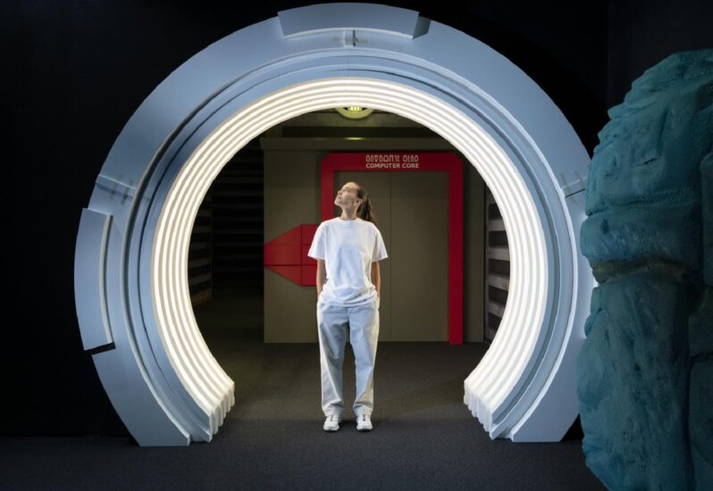 A visitor at the Science Fiction exhibit at the Science Museum