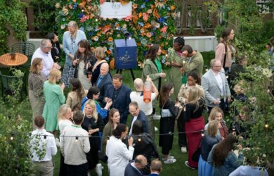 a networking standing reception event on a rooftop