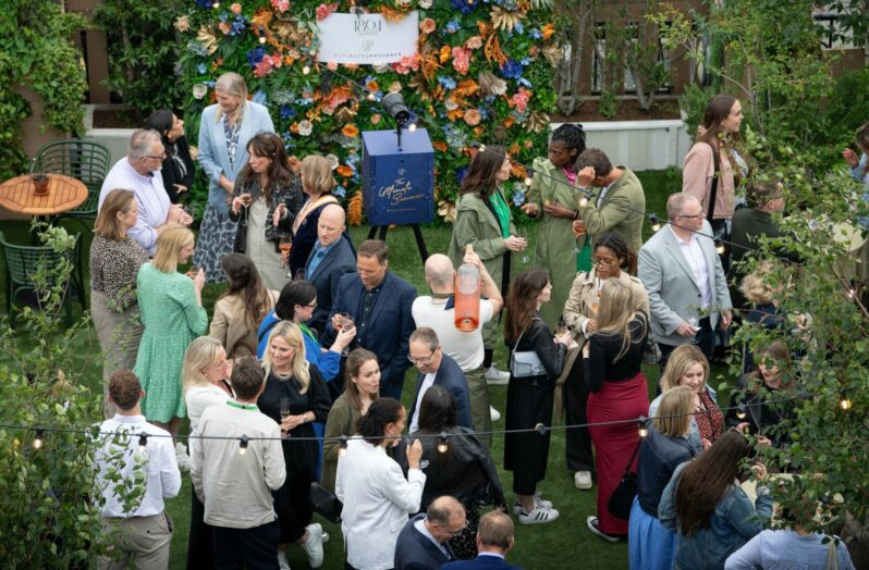a networking standing reception event on a rooftop