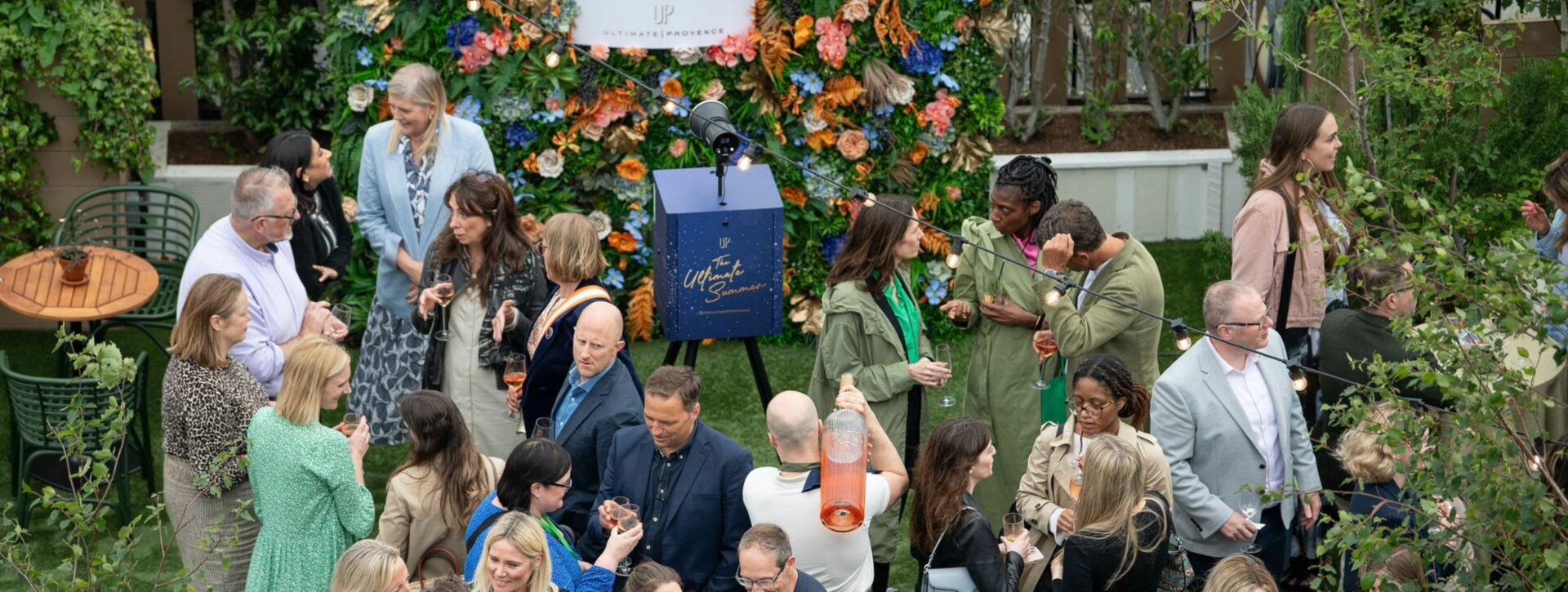 People on a rooftop at an event